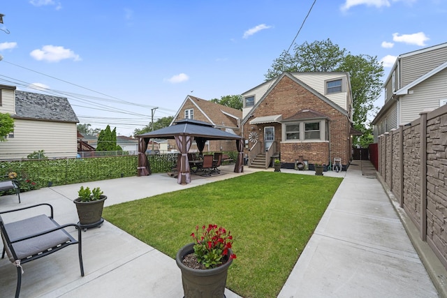 5520 S Kildare Ave, Chicago, IL 60629 - fenced backyard featuring a gazebo and a patio area