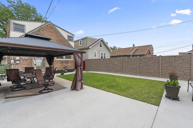 5520 S Kildare Ave, Chicago, IL 60629 - fenced backyard with a gazebo and a patio area