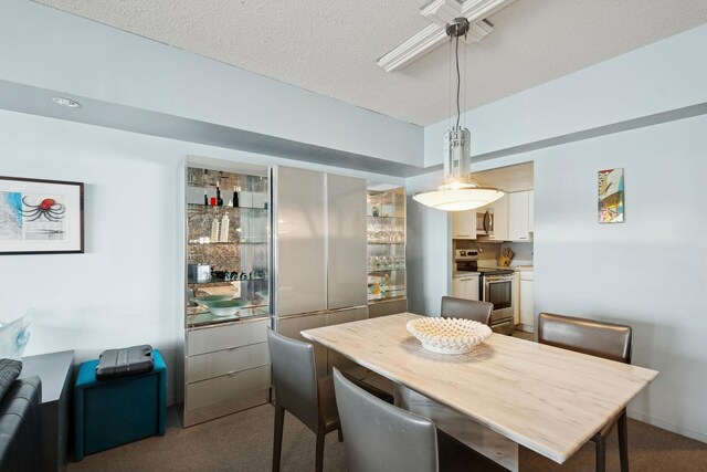 175 E Delaware Pl Unit 8305, Chicago, IL 60611 - carpeted dining area with a ceiling fan and a textured ceiling