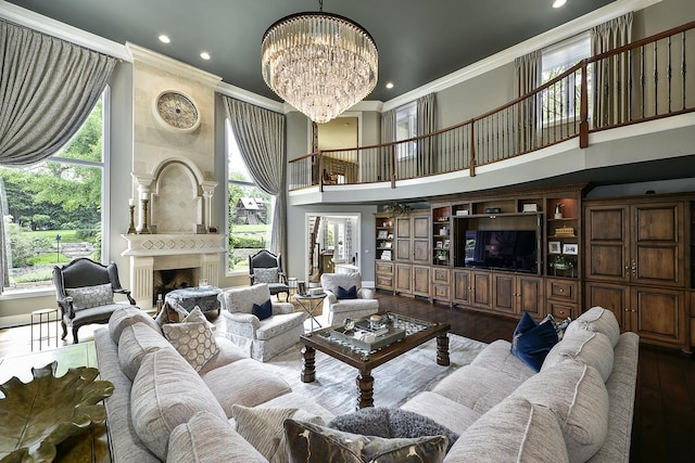 1877 Banbury Rd, Inverness, IL 60067 - living area with crown molding, dark wood-style flooring, a fireplace, a chandelier, and a high ceiling