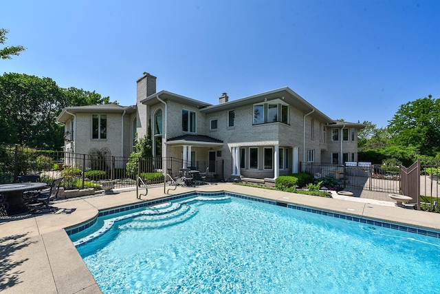 1877 Banbury Rd, Inverness, IL 60067 - view of swimming pool featuring a patio area