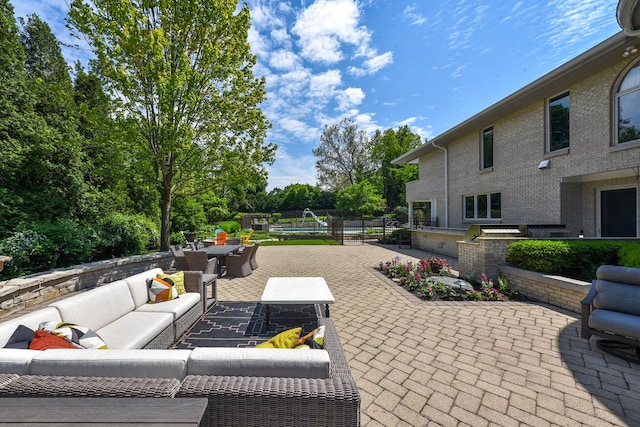 1877 Banbury Rd, Inverness, IL 60067 - view of patio featuring an outdoor living space and a pool