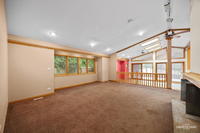 1325 E Lake Ave, Glenview, IL 60025 - unfurnished living room featuring ceiling fan, healthy amount of natural light, carpet flooring, vaulted ceiling, and recessed lighting