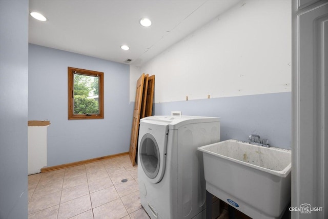 1325 E Lake Ave, Glenview, IL 60025 - laundry room with washer / clothes dryer, recessed lighting, and light tile patterned floors