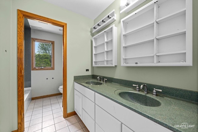 1325 E Lake Ave, Glenview, IL 60025 - bathroom with double vanity, tile patterned floors, and a tub to relax in