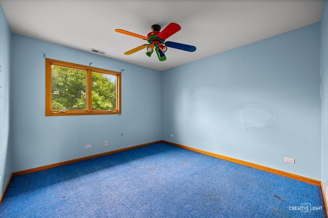 1325 E Lake Ave, Glenview, IL 60025 - carpeted empty room featuring baseboards and a ceiling fan