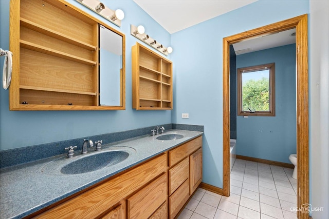 1325 E Lake Ave, Glenview, IL 60025 - bathroom with double vanity, tile patterned floors, and a bath