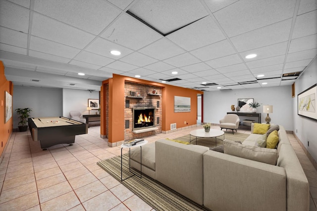 1325 E Lake Ave, Glenview, IL 60025 - living area featuring a brick fireplace, pool table, light tile patterned floors, recessed lighting, and a paneled ceiling