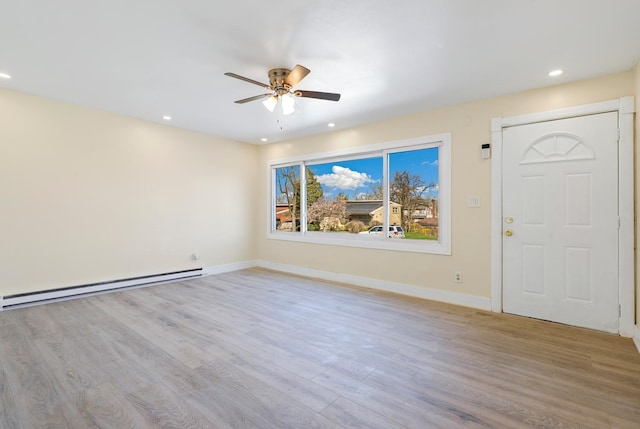 292 W 17th St, Chicago Heights, IL 60411 - unfurnished living room with a baseboard radiator, a ceiling fan, wood finished floors, and recessed lighting