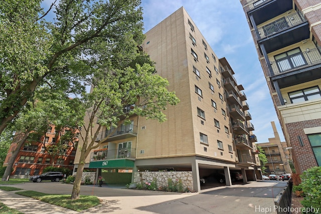 1567 Ridge Ave Unit 401, Evanston, IL 60201 - view of apartment building / complex featuring covered parking