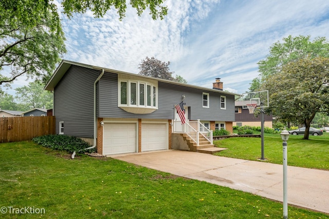 6943 Parkview Dr, Downers Grove, IL 60516 - raised ranch featuring a garage, concrete driveway, a chimney, and brick siding