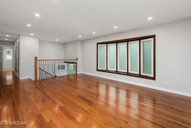 6943 Parkview Dr, Downers Grove, IL 60516 - unfurnished room featuring hardwood / wood-style floors and recessed lighting