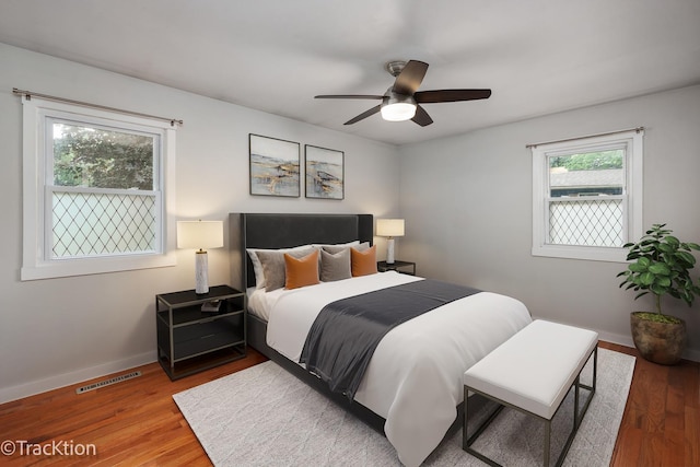 6943 Parkview Dr, Downers Grove, IL 60516 - bedroom with wood finished floors and a ceiling fan