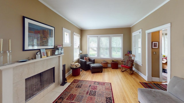 1025 Wesley Ave, Evanston, IL 60202 - sitting room featuring ornamental molding, light wood-style flooring, and a high end fireplace