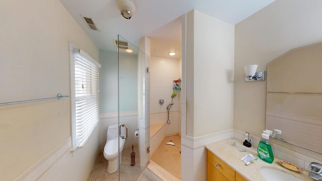1025 Wesley Ave, Evanston, IL 60202 - full bath with tile patterned floors, a walk in shower, and double vanity