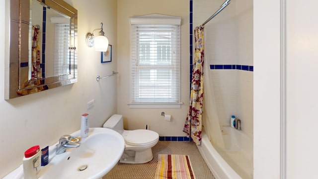 1025 Wesley Ave, Evanston, IL 60202 - bathroom with tile patterned floors, shower / tub combo with curtain, and plenty of natural light