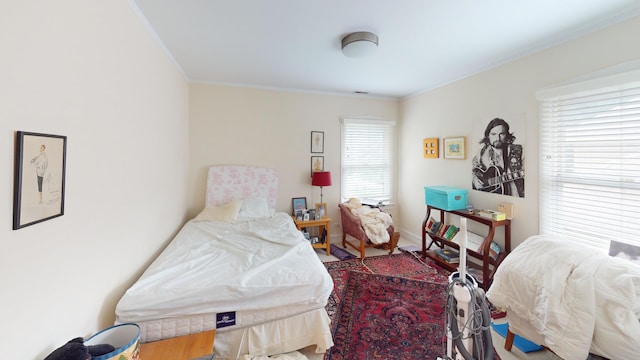 1025 Wesley Ave, Evanston, IL 60202 - bedroom with ornamental molding and wood finished floors