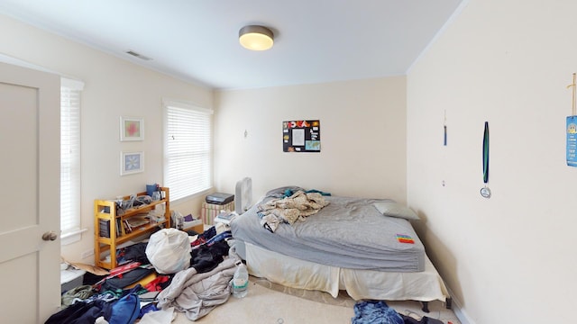 1025 Wesley Ave, Evanston, IL 60202 - bedroom with crown molding and carpet flooring