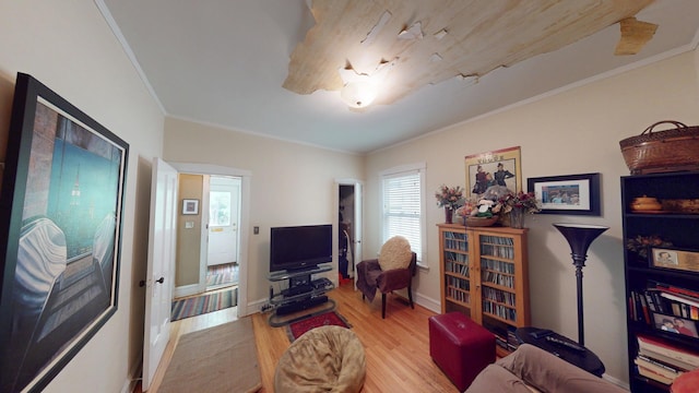 1025 Wesley Ave, Evanston, IL 60202 - living area featuring wood finished floors and crown molding