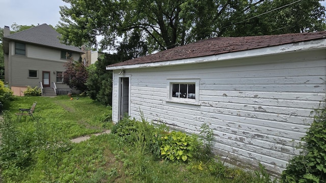 1025 Wesley Ave, Evanston, IL 60202 - view of side of home with entry steps and a yard