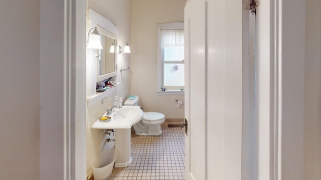 1025 Wesley Ave, Evanston, IL 60202 - bathroom with toilet and tile patterned floors
