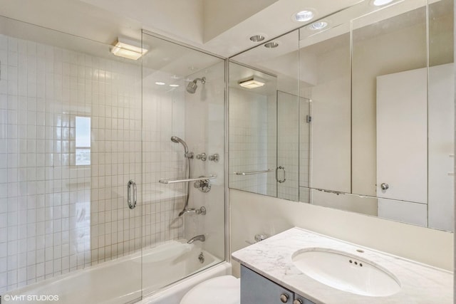1550 N Lake Shore Dr Unit 32C, Chicago, IL 60610 - bathroom featuring vanity, enclosed tub / shower combo, and toilet