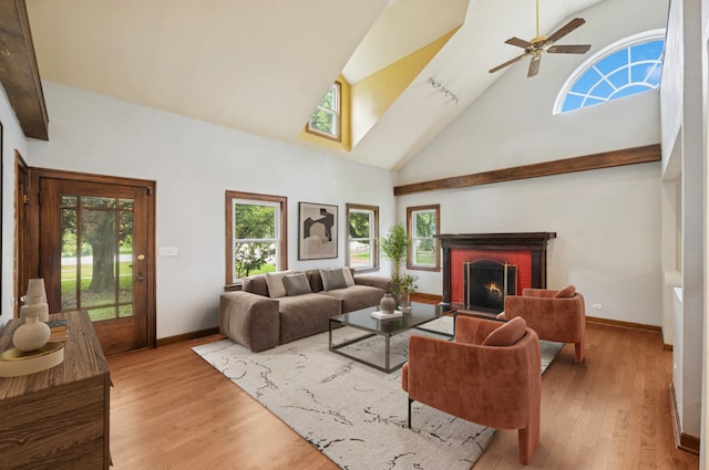1800 Shermer Rd, Northbrook, IL 60062 - living room with high vaulted ceiling, healthy amount of natural light, light wood-type flooring, ceiling fan, and a fireplace