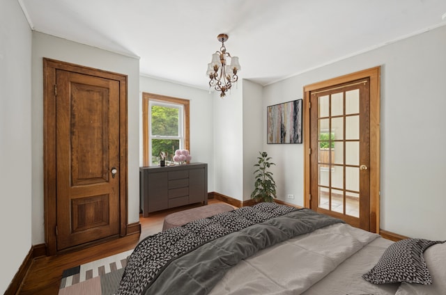 1800 Shermer Rd, Northbrook, IL 60062 - bedroom with a chandelier and wood finished floors