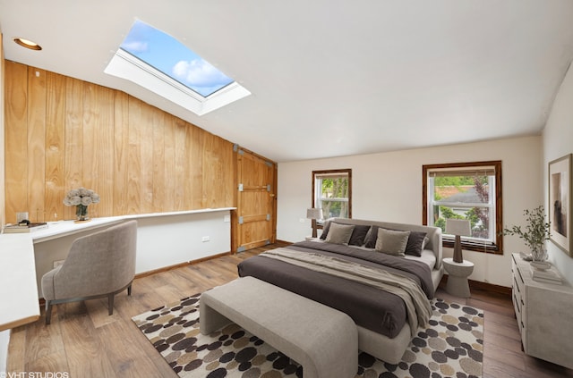 1800 Shermer Rd, Northbrook, IL 60062 - bedroom with a skylight, wood finished floors, a desk, and lofted ceiling