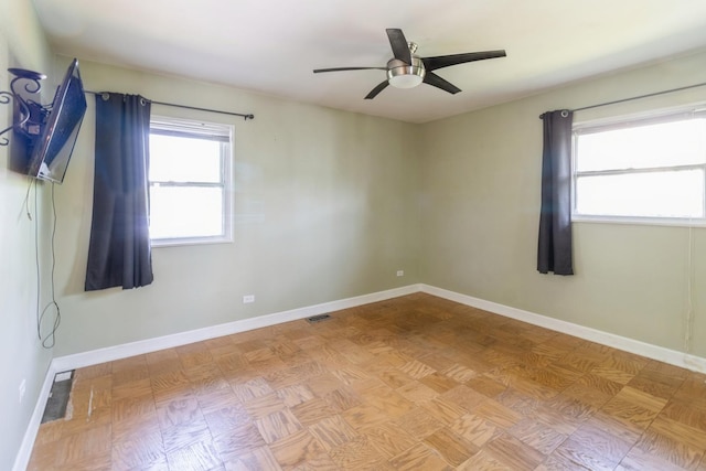 848 Bonita Ave, Elk Grove Village, IL 60007 - empty room featuring plenty of natural light and a ceiling fan