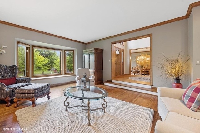 3104 Royal Fox Dr, Saint Charles, IL 60174 - living room with wood finished floors, ornamental molding, and a chandelier