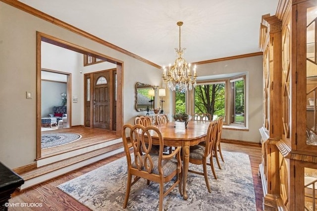 3104 Royal Fox Dr, Saint Charles, IL 60174 - dining room with a chandelier, light wood finished floors, and ornamental molding