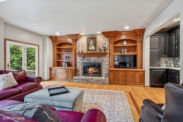 3104 Royal Fox Dr, Saint Charles, IL 60174 - living room featuring light wood-type flooring, a brick fireplace, and recessed lighting
