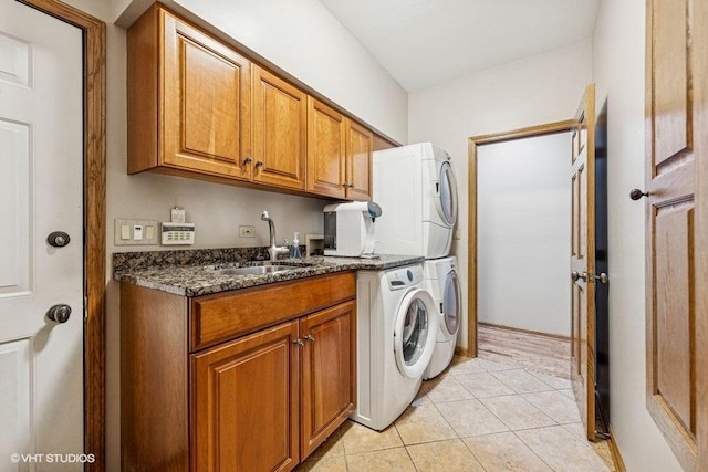 3104 Royal Fox Dr, Saint Charles, IL 60174 - laundry area featuring cabinet space, stacked washer / drying machine, and light tile patterned floors