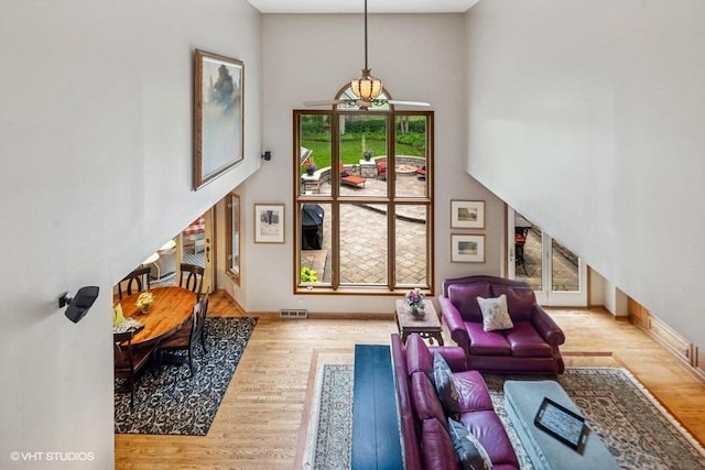 3104 Royal Fox Dr, Saint Charles, IL 60174 - living room with wood finished floors and a towering ceiling
