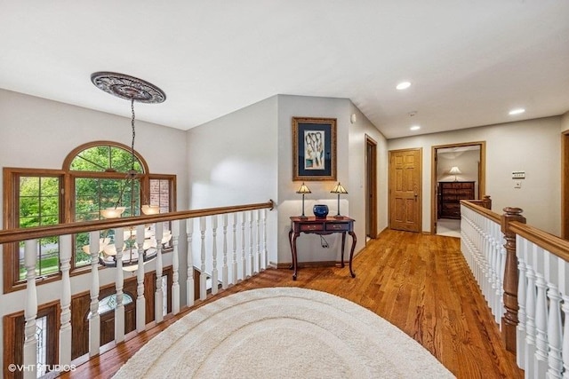 3104 Royal Fox Dr, Saint Charles, IL 60174 - hall with wood finished floors, recessed lighting, and an upstairs landing