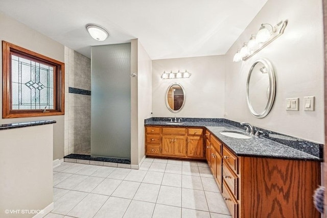 3104 Royal Fox Dr, Saint Charles, IL 60174 - bathroom featuring double vanity, tile patterned floors, and walk in shower