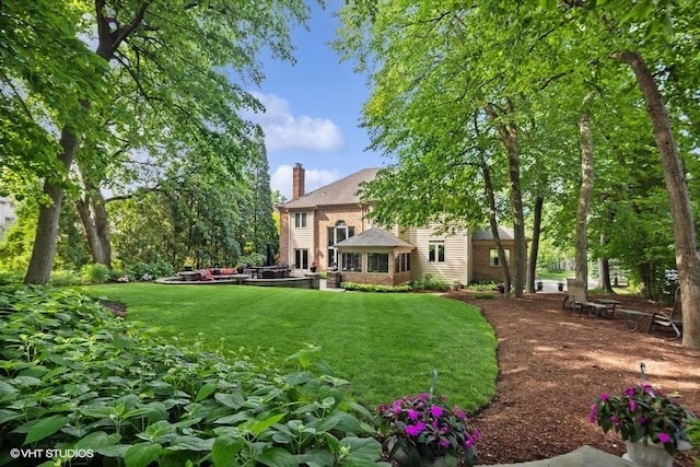 3104 Royal Fox Dr, Saint Charles, IL 60174 - rear view of house featuring a chimney and a yard