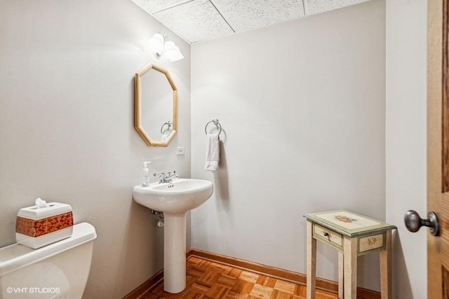 3104 Royal Fox Dr, Saint Charles, IL 60174 - half bathroom featuring baseboards and a drop ceiling