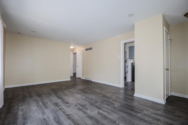 14909 Langley Ave, Dolton, IL 60419 - empty room featuring dark wood-type flooring and baseboards