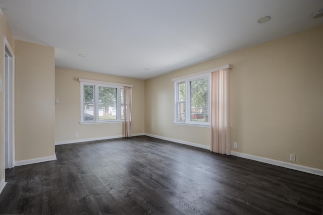 14909 Langley Ave, Dolton, IL 60419 - unfurnished room with dark wood-style floors and baseboards
