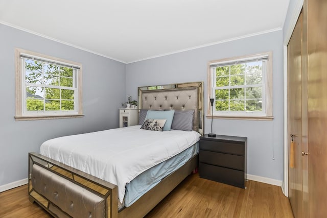 1145 Wincanton Dr, Deerfield, IL 60015 - bedroom with multiple windows, crown molding, and wood finished floors