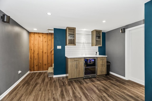 1145 Wincanton Dr, Deerfield, IL 60015 - indoor dry bar featuring wine cooler, dark wood-style floors, recessed lighting, backsplash, and stairs