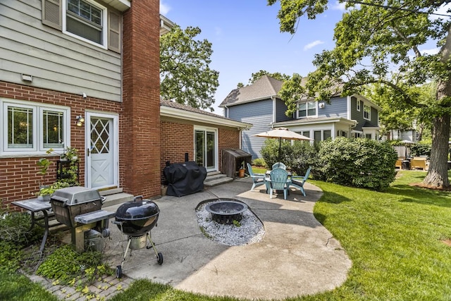 1145 Wincanton Dr, Deerfield, IL 60015 - view of patio / terrace featuring entry steps, area for grilling, and an outdoor fire pit