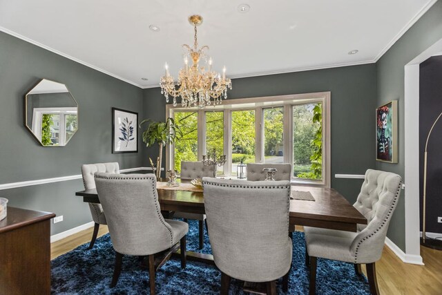 1145 Wincanton Dr, Deerfield, IL 60015 - dining room featuring a chandelier, wood finished floors, and ornamental molding