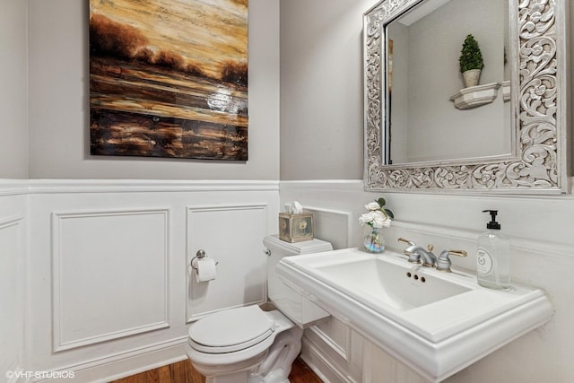 9520 Nicklaus Ln, Crystal Lake, IL 60014 - bathroom featuring toilet and wainscoting