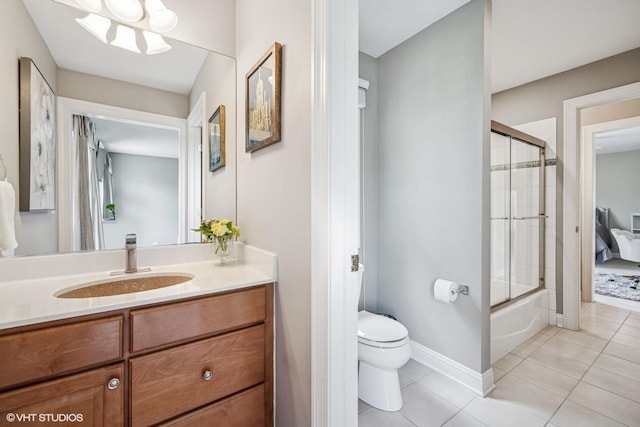 9520 Nicklaus Ln, Crystal Lake, IL 60014 - full bathroom featuring tile patterned flooring, vanity, and combined bath / shower with glass door