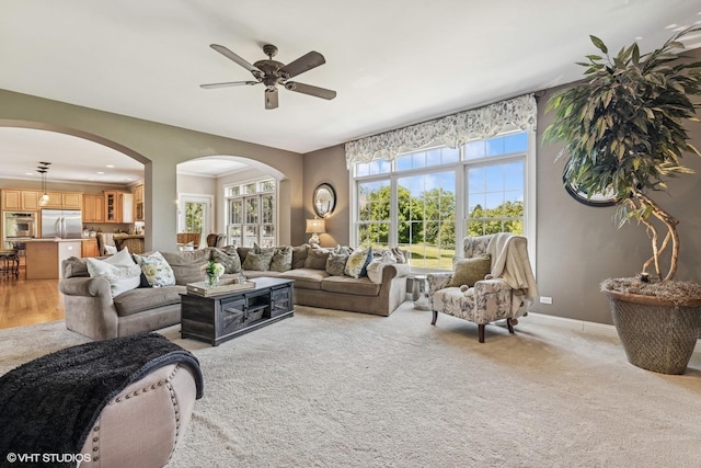 9520 Nicklaus Ln, Crystal Lake, IL 60014 - living room with arched walkways and a ceiling fan