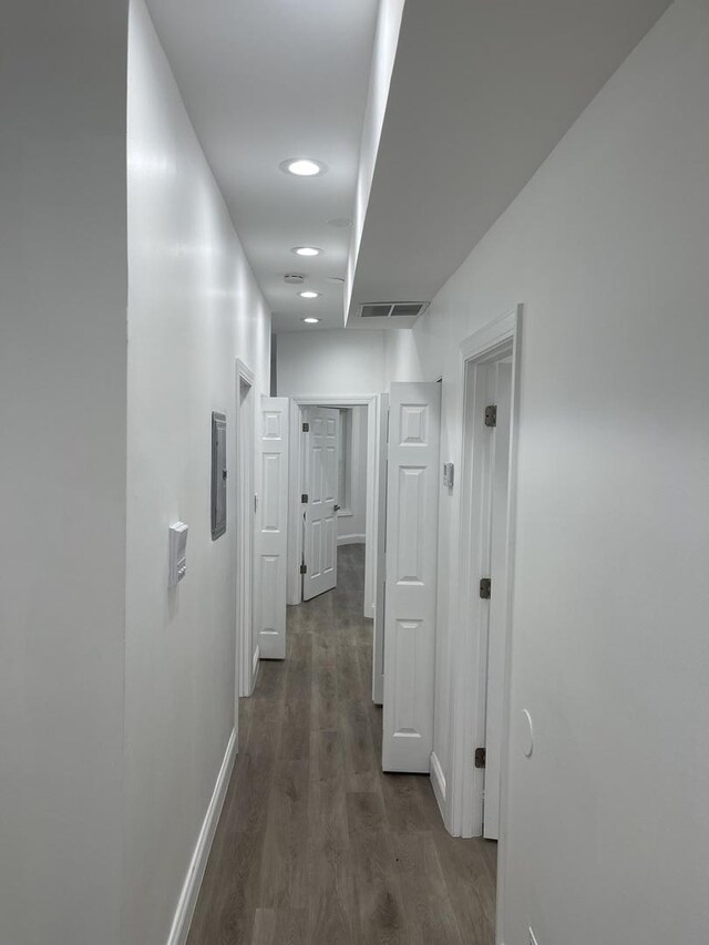 6141 S Eberhart Ave, Chicago, IL 60637 - corridor featuring dark wood-style flooring, baseboards, and recessed lighting