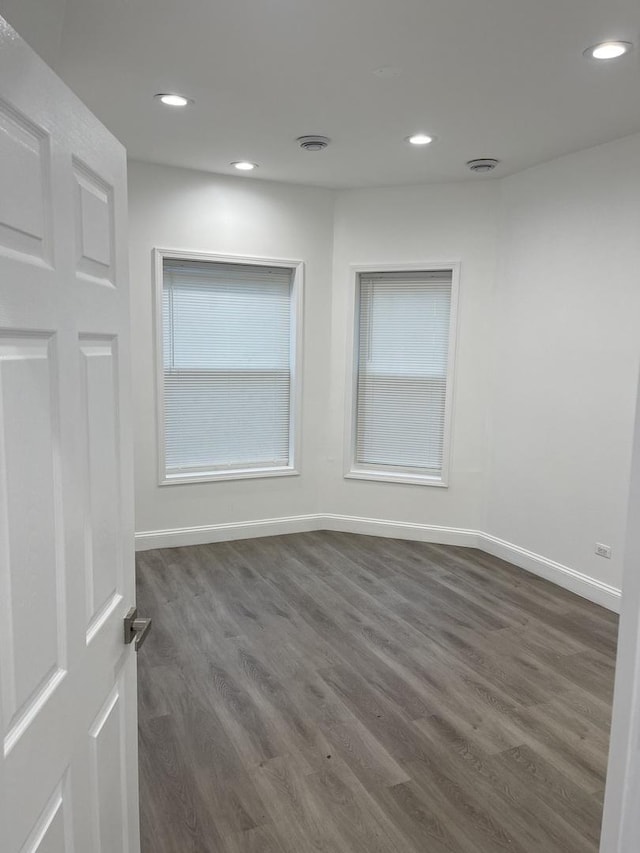 6141 S Eberhart Ave, Chicago, IL 60637 - unfurnished room featuring recessed lighting, dark wood-type flooring, and baseboards